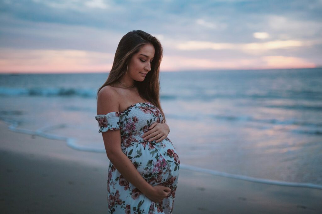 pregnant woman in seashore